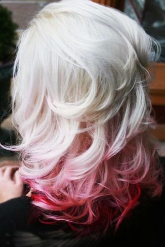 Bombshell Blonde with Bright Red Accents