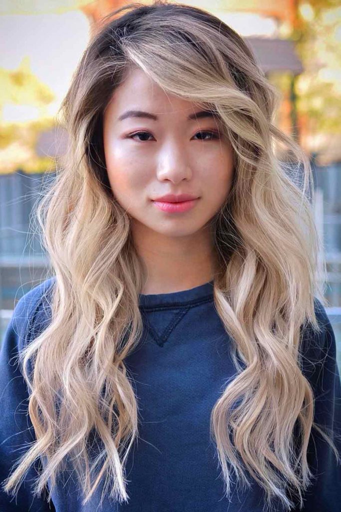 Voluminous Waves With Side-Swept Bangs