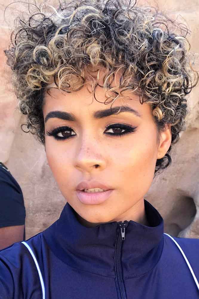 Curly Pixie With Blonde Highlights #shortcurlyhairstyles #curlyhairstyles #pixiehaircut #hairstyles