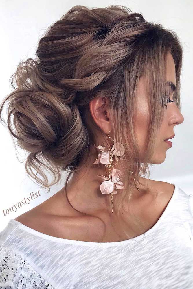 Twisted Low Bun Center Parted Hairstyles With Bangs #hairstyleswithbangs #hairstyles #bangs #bobhairstyles #updohairstyles