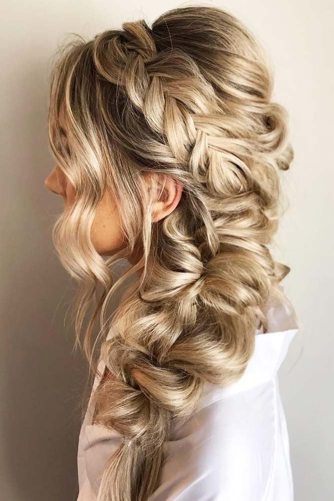 Image of Messy updo with braids for oval round face