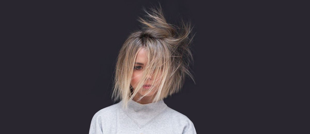 Blunt bob with vibrant purple hair