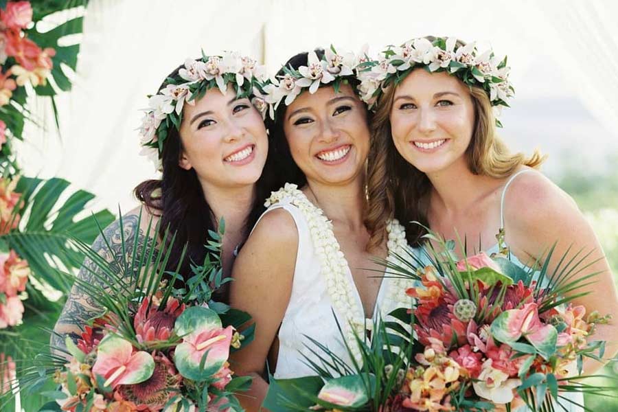 Charming Bridesmaids Hairstyles Completed With Flowers