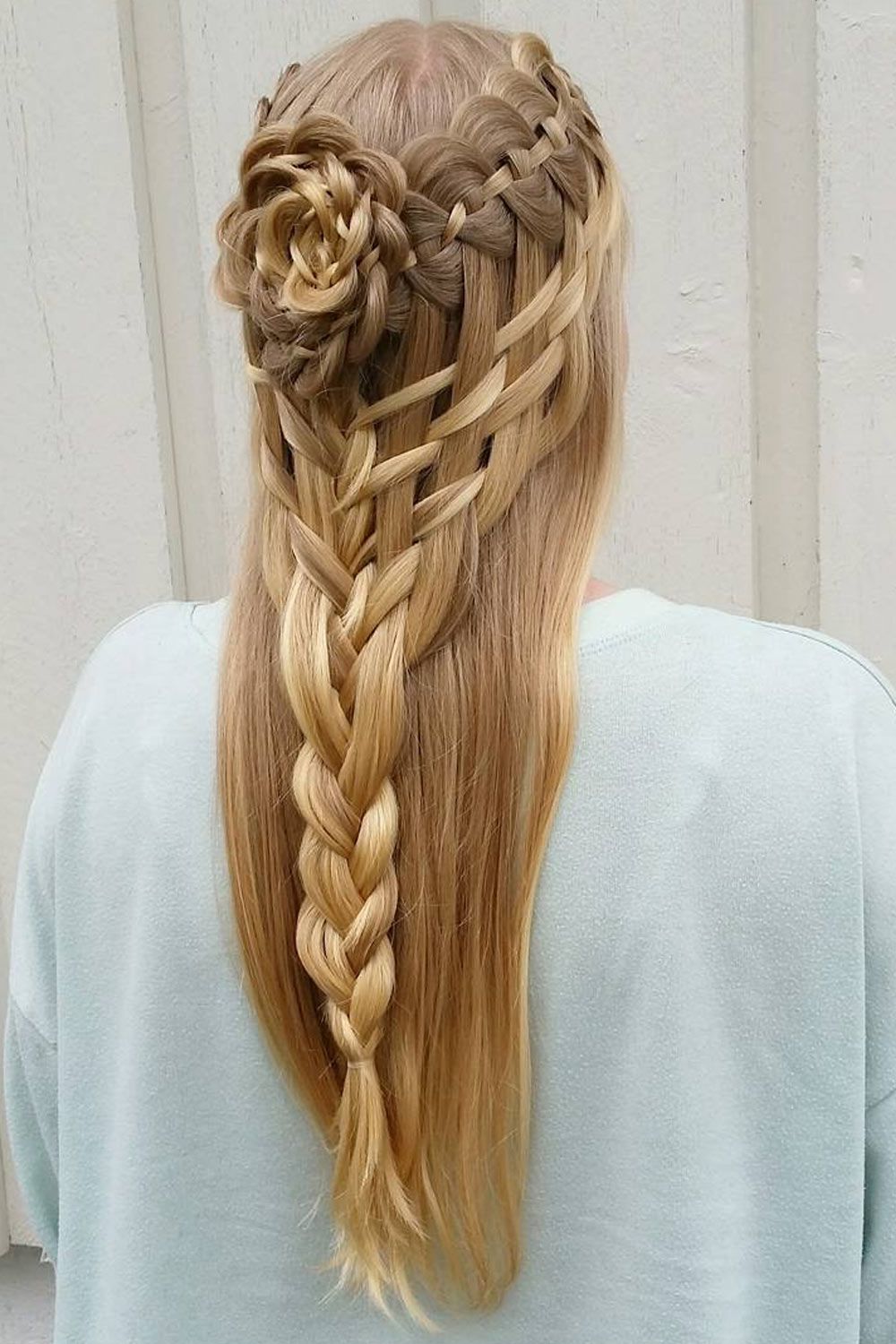 Hairstyle With Ladder Braid And Braided Flower