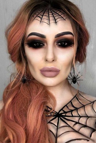 Sexy Spider Lady With Low Messy Ponytail #halloweenhairstyles #halloween #hairstyles #longhair