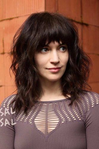 long wavy layered bob with bangs