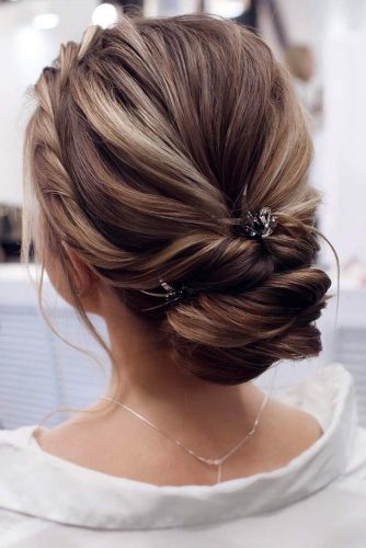 Accessorized Low Chignon Bun With Twists #chignonbun #hairstyles #bunhairstyles