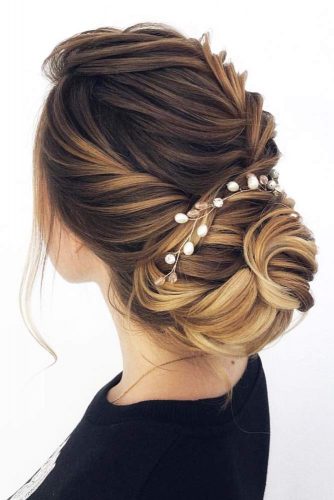 Accessorized Chignon Bun With Twists #chignonbun #hairstyles #bunhairstyles