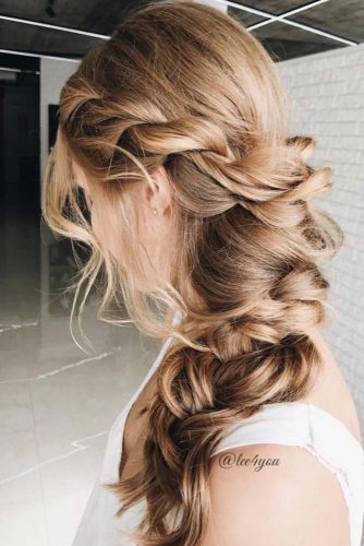 messy side braid wedding