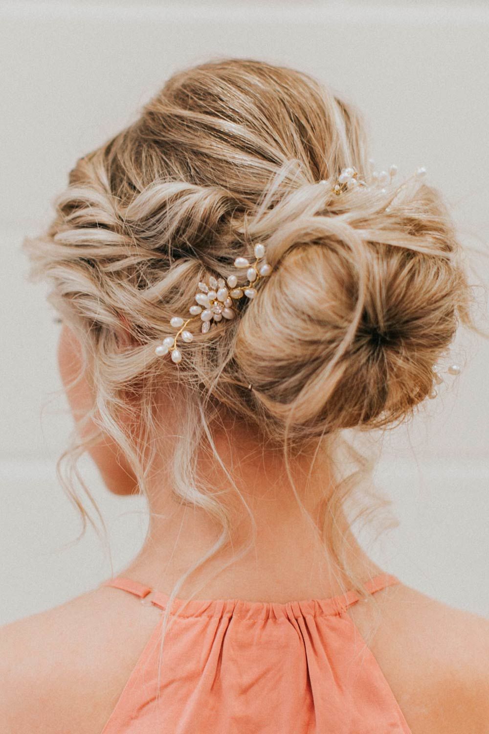 Messy And Accessorized Blonde Updo Hairstyle