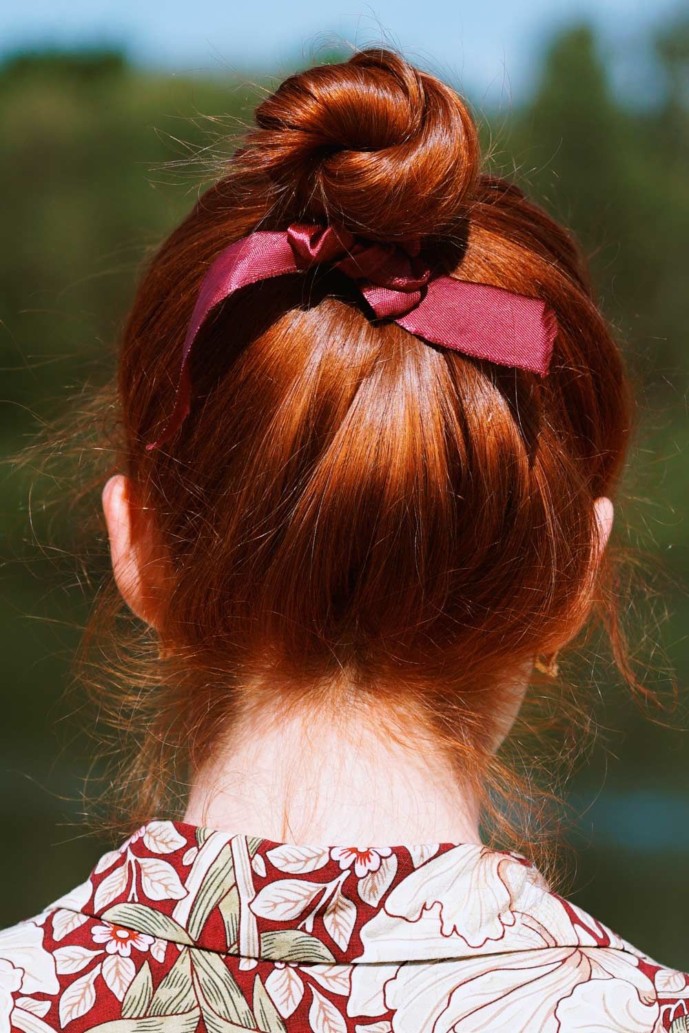 Sleek Hair Bun With Stripe