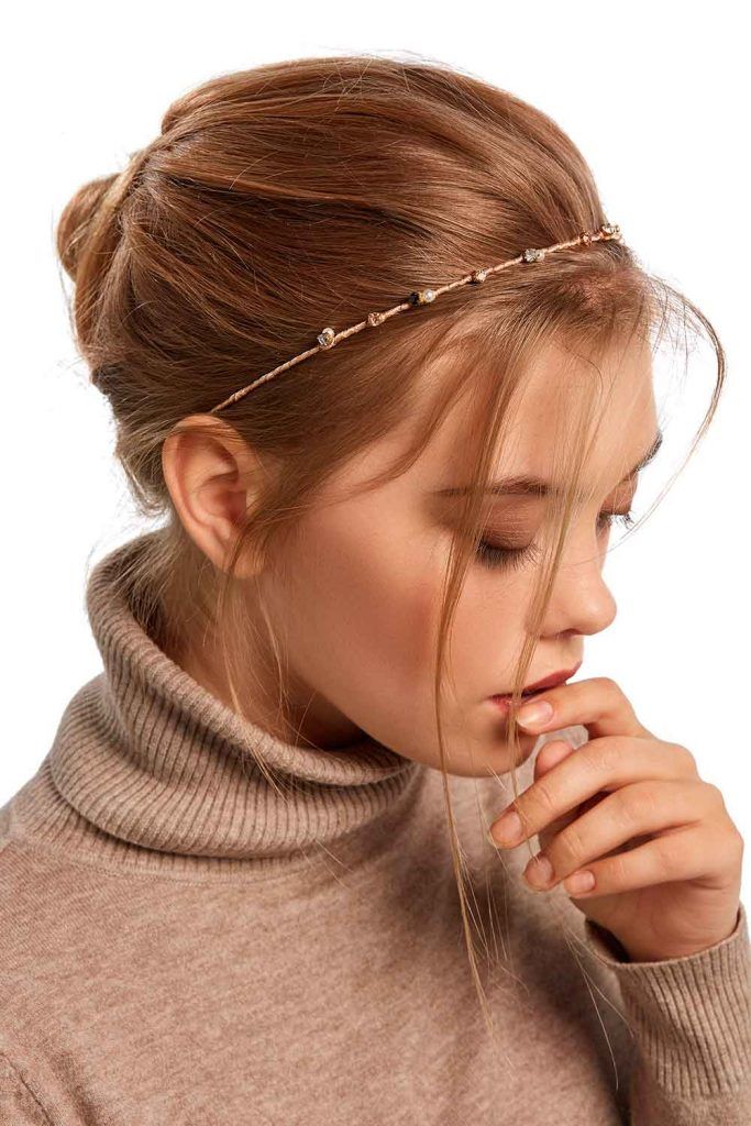 Accessorized Messy Low Bun