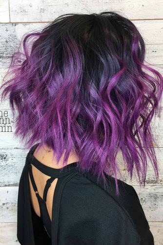 Angled Bob With Purple Balayage Highlights #purplehighlights #highlights #haircolor #wavyhair #longbob