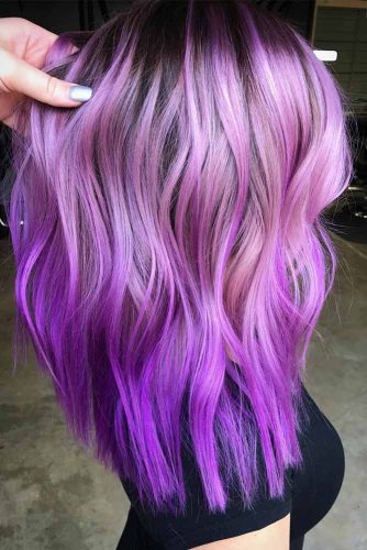 dark brown hair with purple and blonde highlights