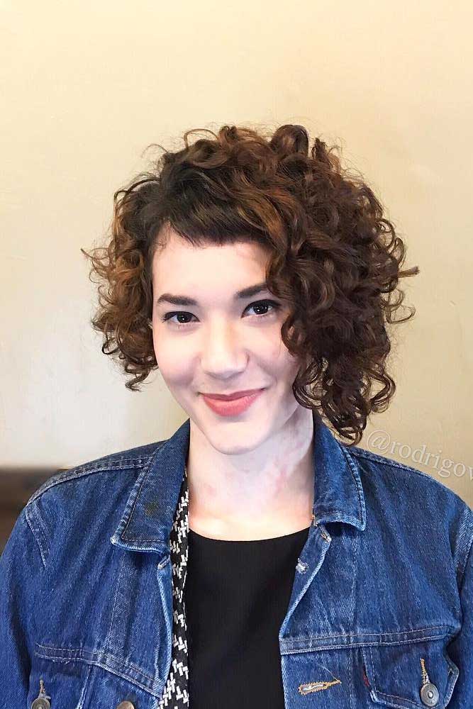 Asymmetrical Curly Bob With Baby Bangs #curlybob #haircuts #bobhaircuts #asymmetricalbob