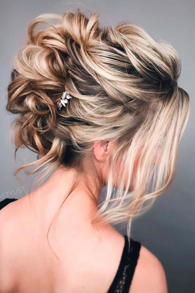 Elegant Updo With Side Swept Wispy Bangs