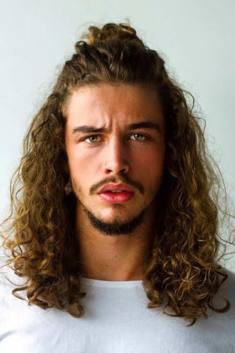 How To Get Style And Sport The On Trend Man Bun Hairstyle