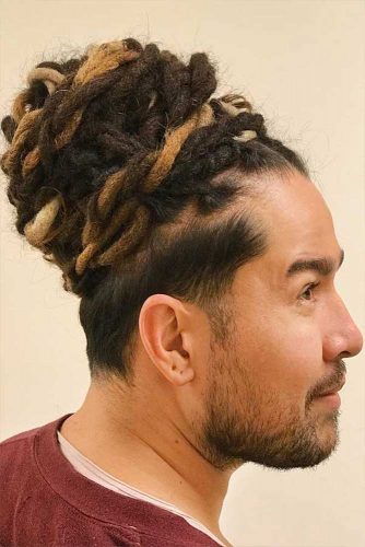 How To Get Style And Sport The On Trend Man Bun Hairstyle