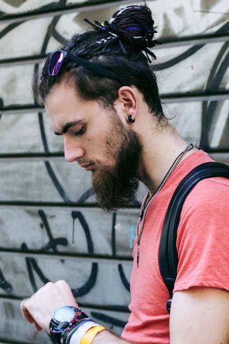 How To Get Style And Sport The On Trend Man Bun Hairstyle