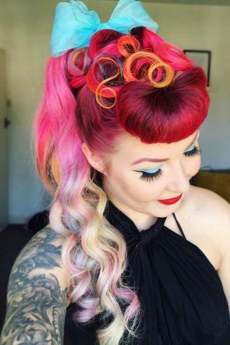 Image of Ponytail with victory rolls pin up hairstyle long hair