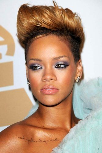 Rihannas new short hairstyle with a short clip that moved over her ears