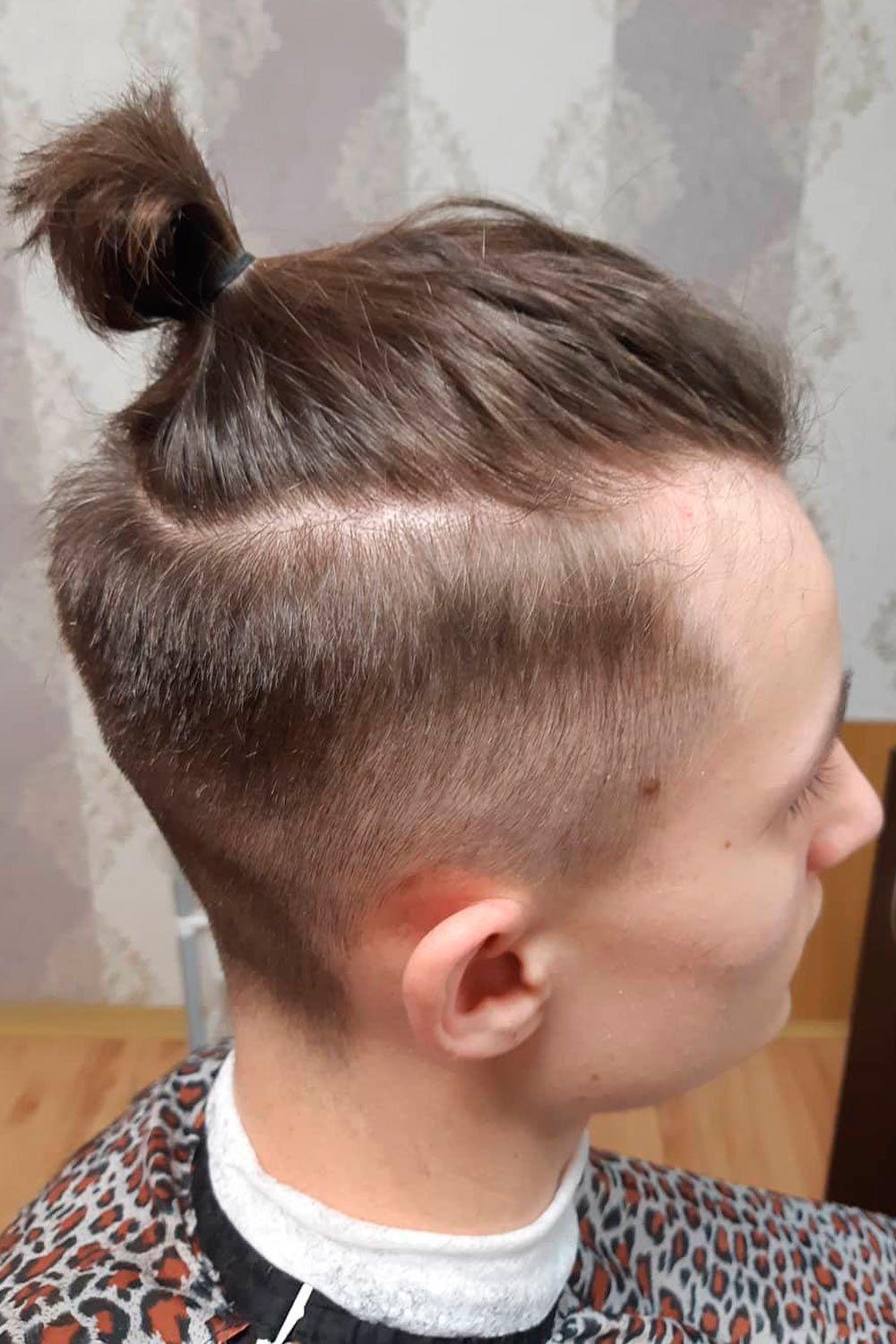 How To Get Style And Sport The On Trend Man Bun Hairstyle