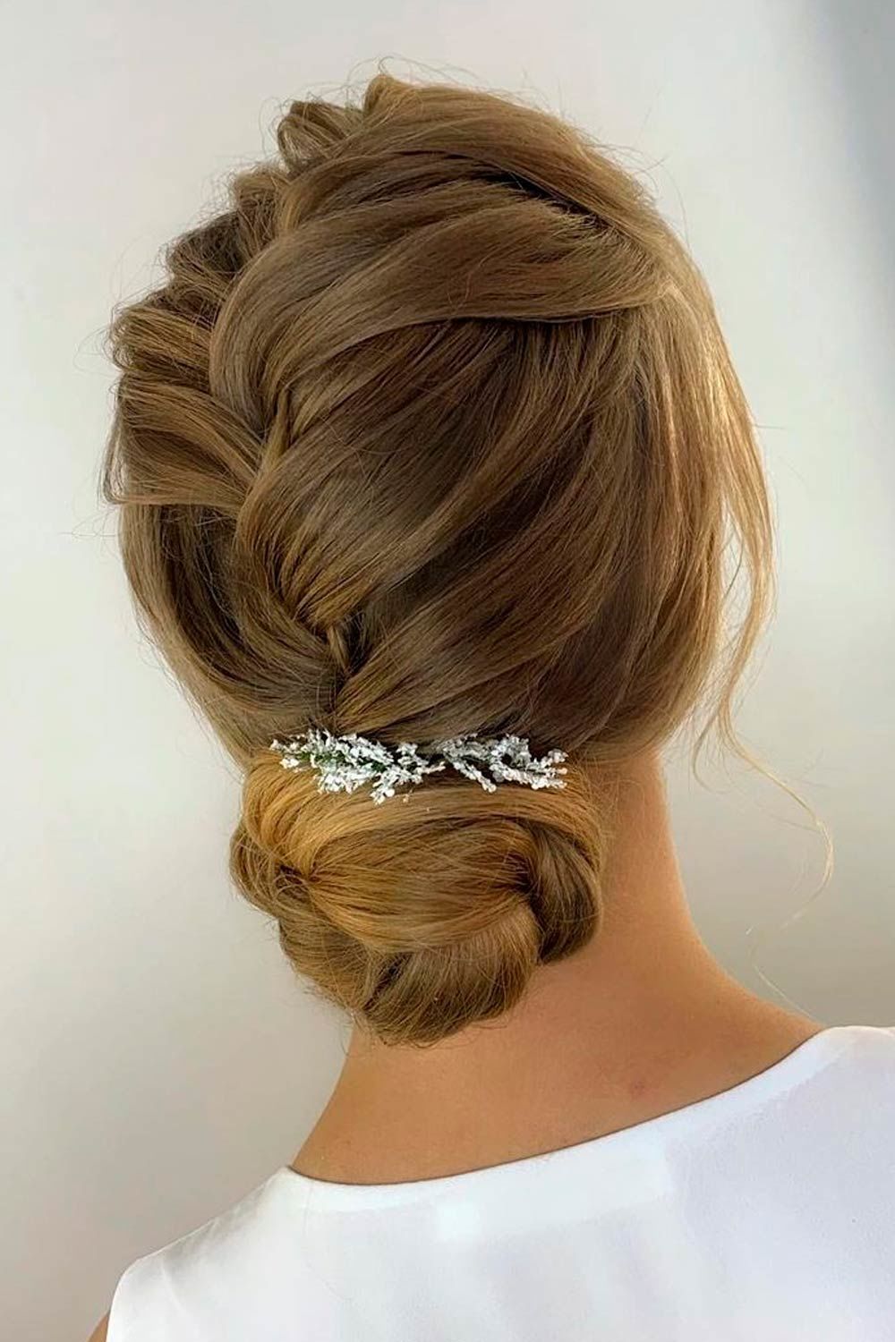 Braided Low Bun With Long Bangs 