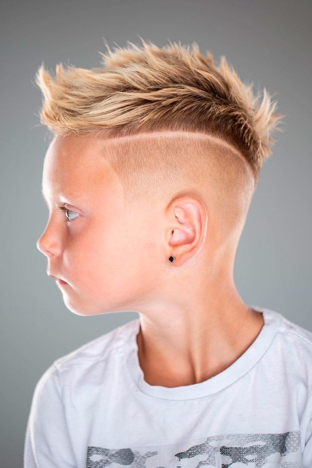 Developing a hair care routine that works. Little child with stylish haircut.  Little child with short haircut. Small boy with blond hair. Healthy hair  Stock Photo - Alamy