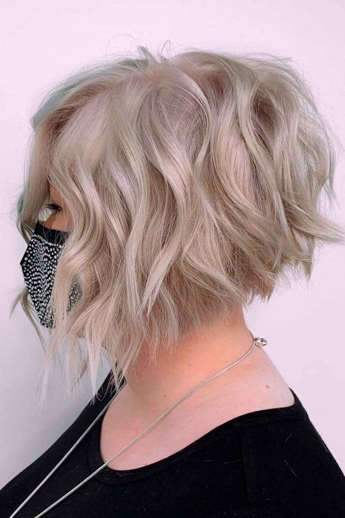 short stacked curly wedge haircut