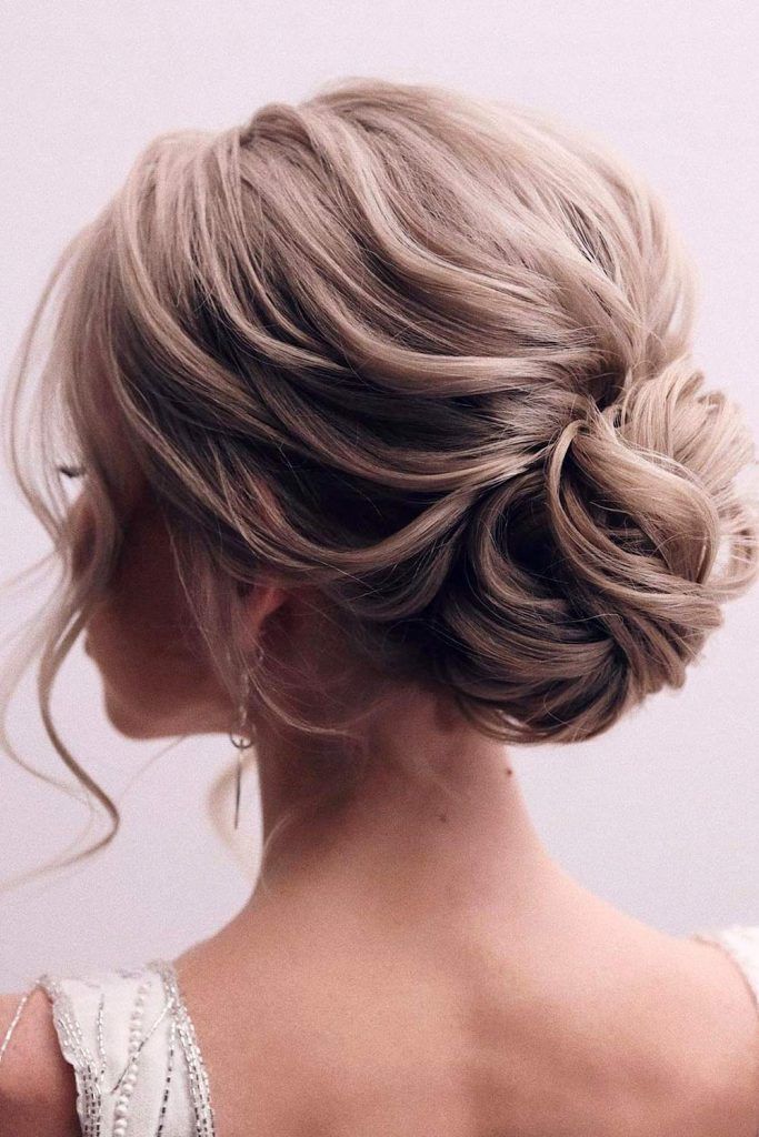 Messy Updo To Wear With A Graduation Cap 