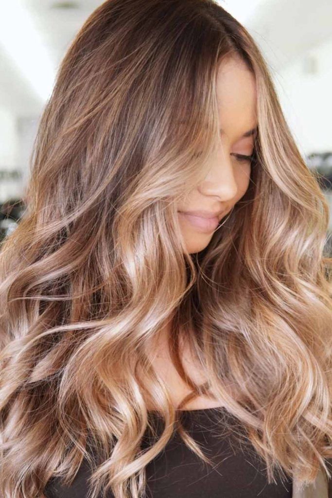 wavy brown hair with blonde highlights