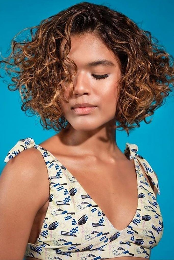 18 Best Curly Haircuts To Flatter Oval Faces