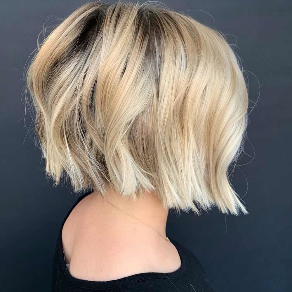 Creamy Blonde Hair With Dark Roots