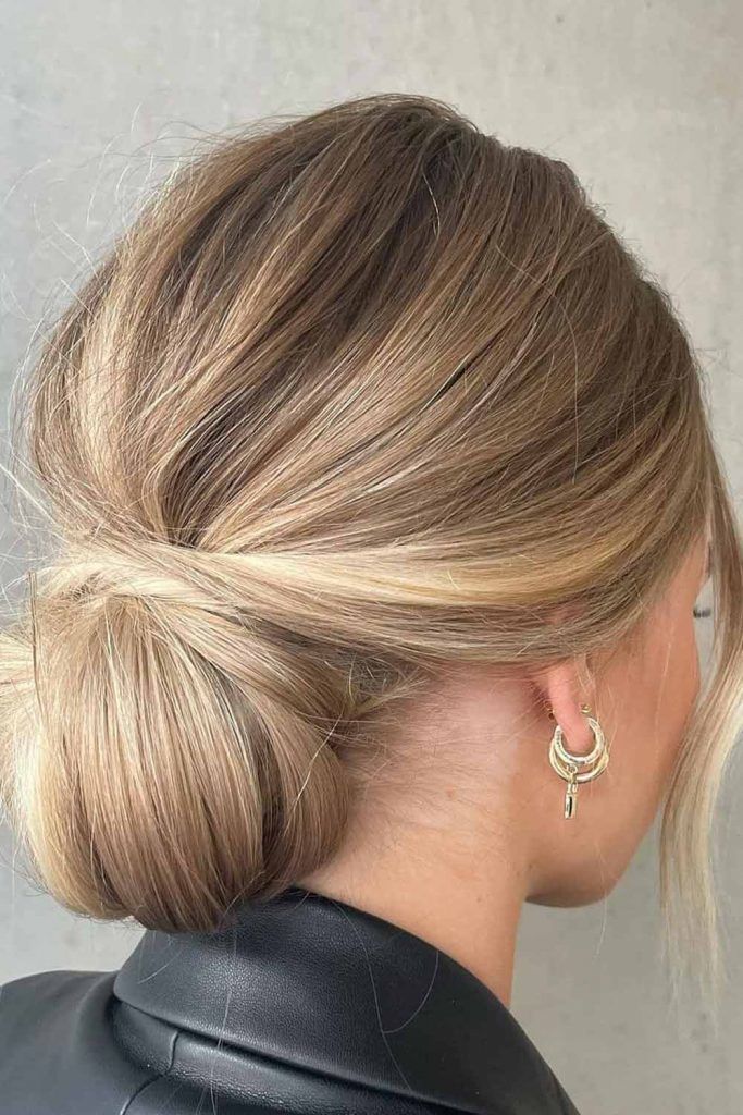 Highlighted Low Messy Bun Hairstyle