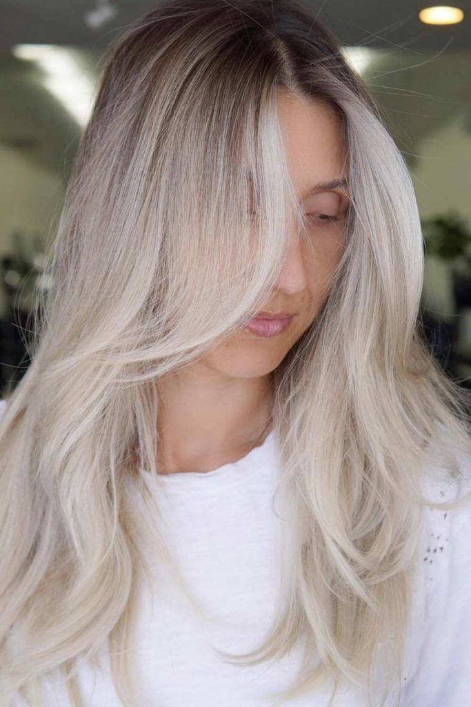 olive skin tone with platinum blonde hair