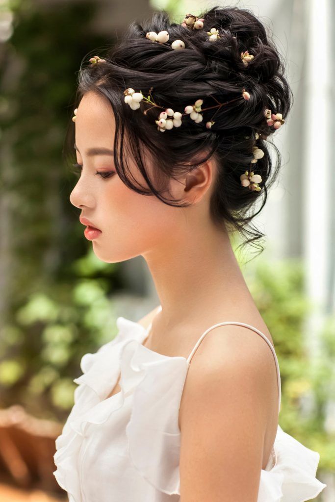 Braided Updo With Floral Accessories