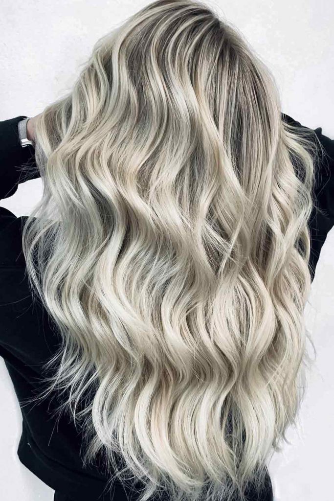 platinum blonde hair with brown roots