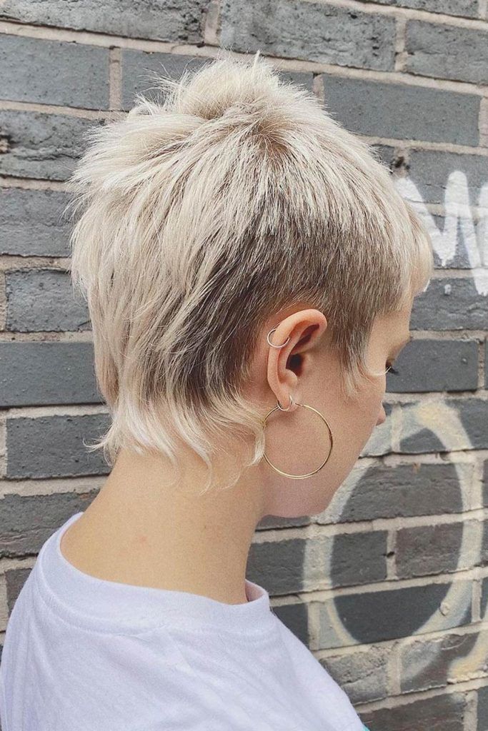 pixie cut with long sideburns