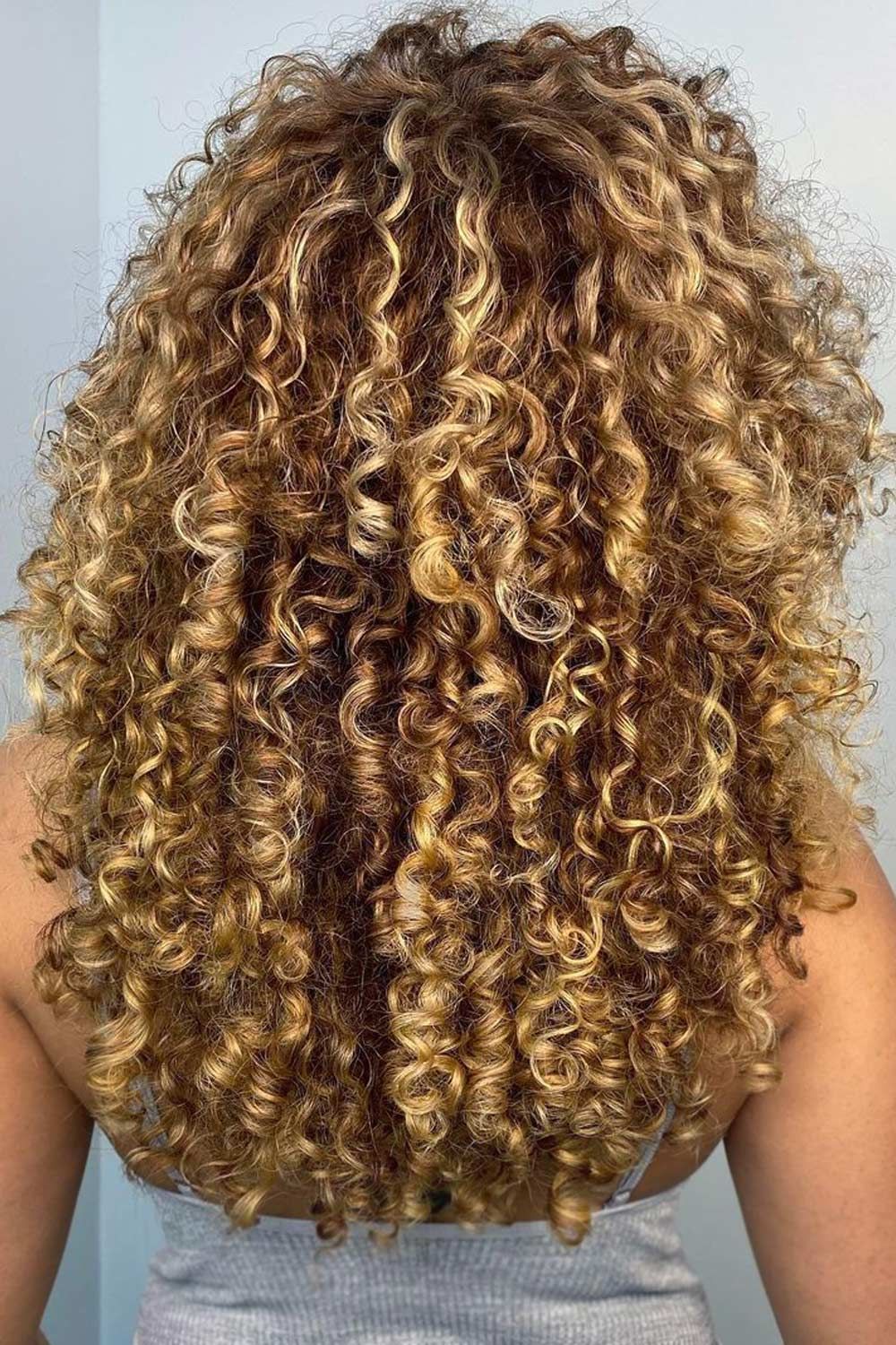 Stacked layers of curls make an incredibly impactful hair look.
