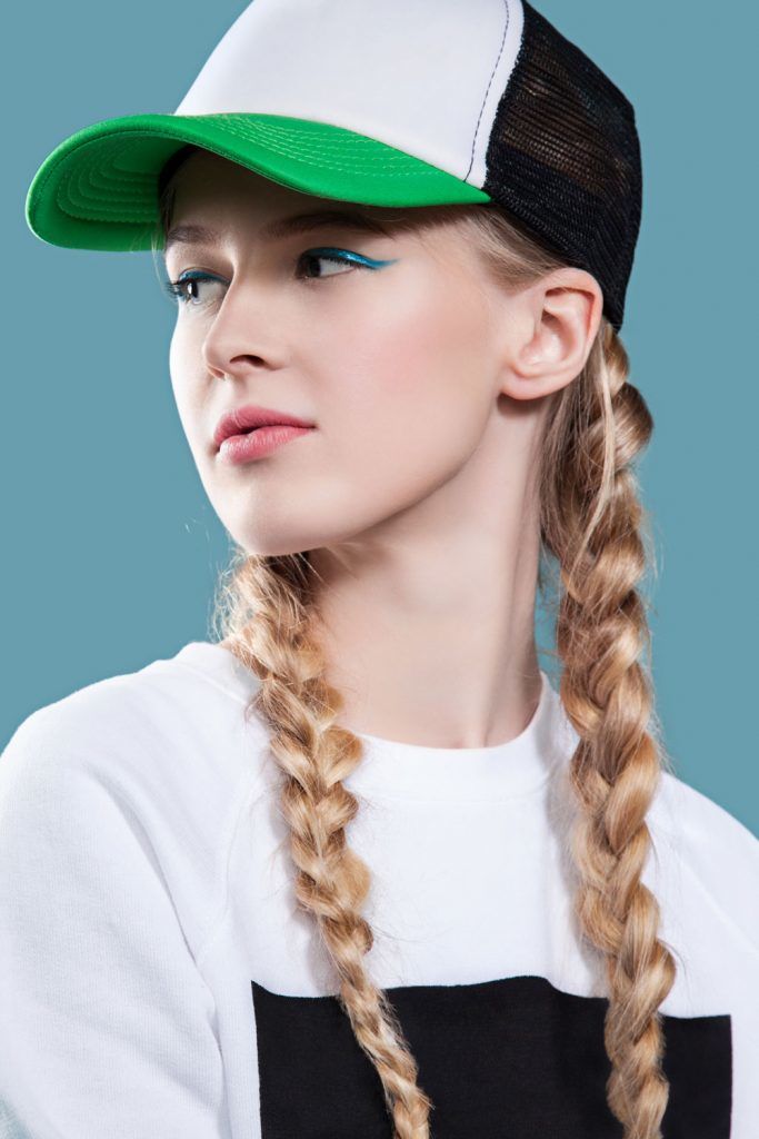 >If you play sports that suggest wearing a helmet, such as softball or baseball, then braided pigtails are your failsafe option.