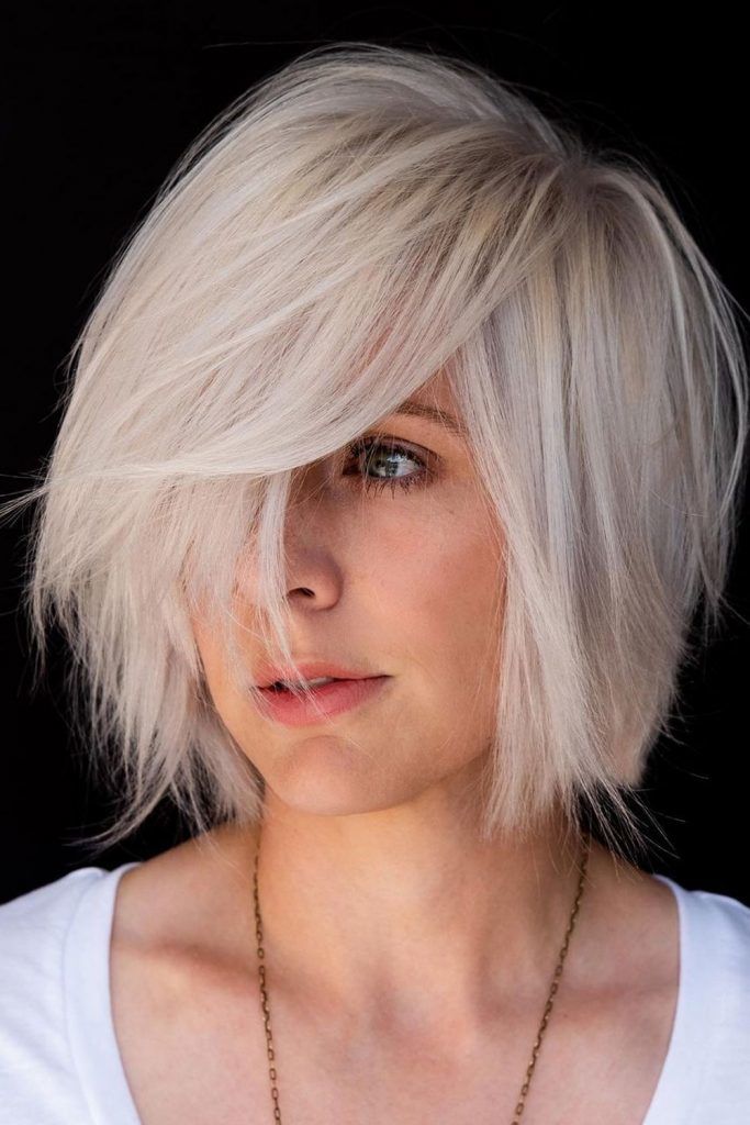 Deep Sided Blonde Bob with Face-Framing Feathers