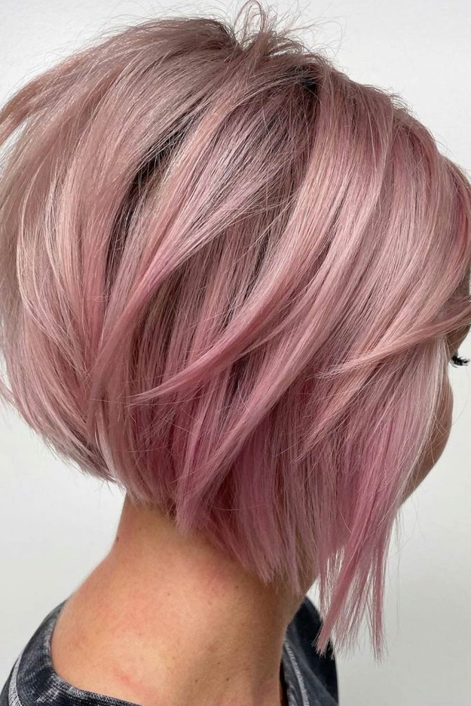 Stacked Pastel-Pink Bob with Feathered Locks