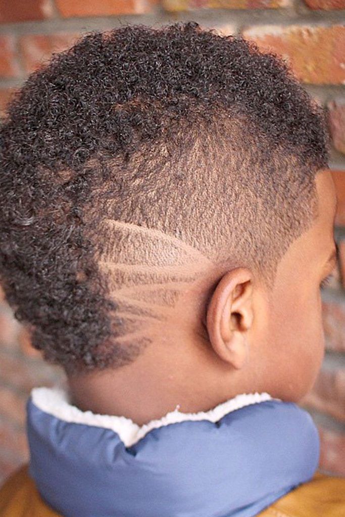 There are multiple variations of a mohawk haircut kids with curly hair can get.