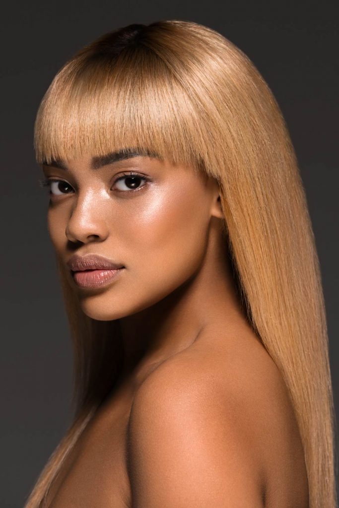 When you cannot decide between blonde and brown hair, a sandy blonde shade comes into play. 