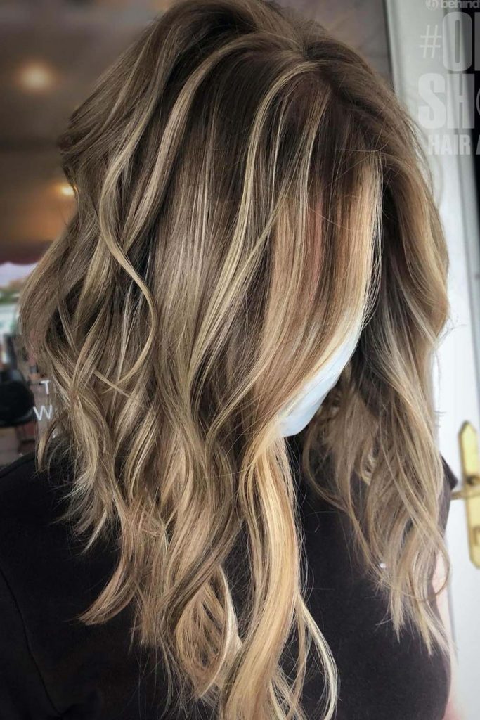 Medium length layered hair looks ravishing when it’s middle-parted.