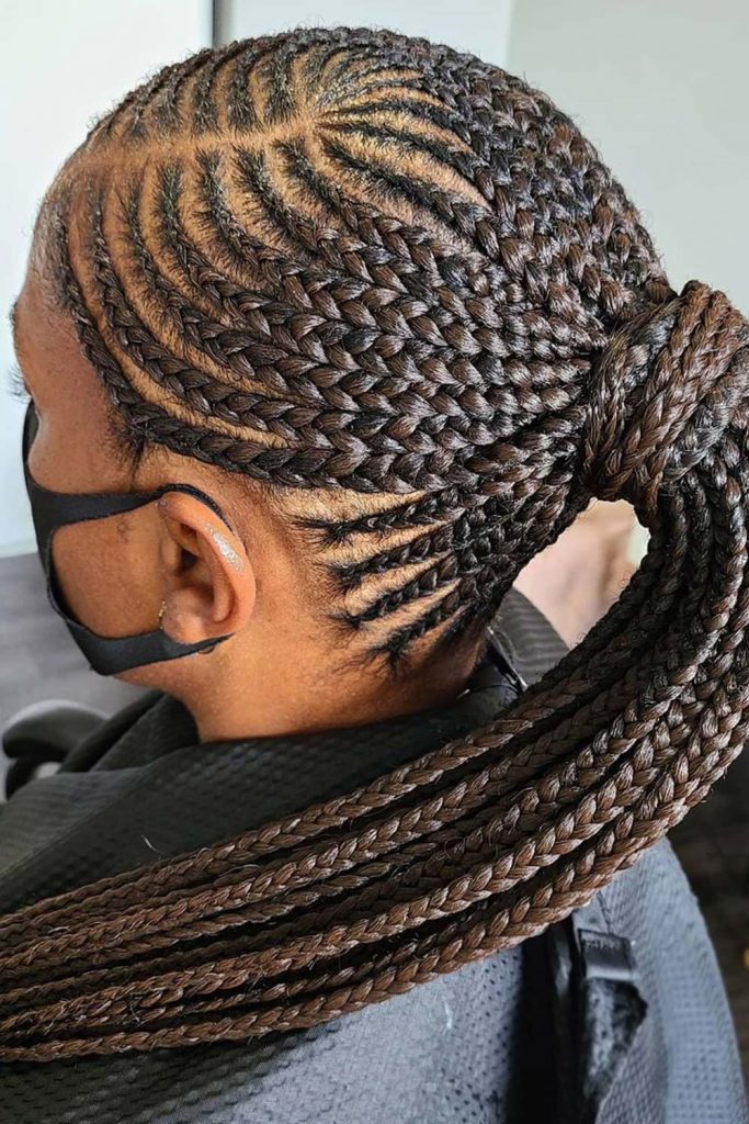 This structured and textured ponytail with its Fulani side braids just makes our hearts skip a beat!
