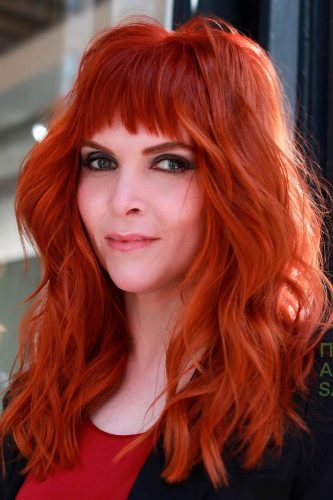 Cortes de pelo de pelo largo con flequillo