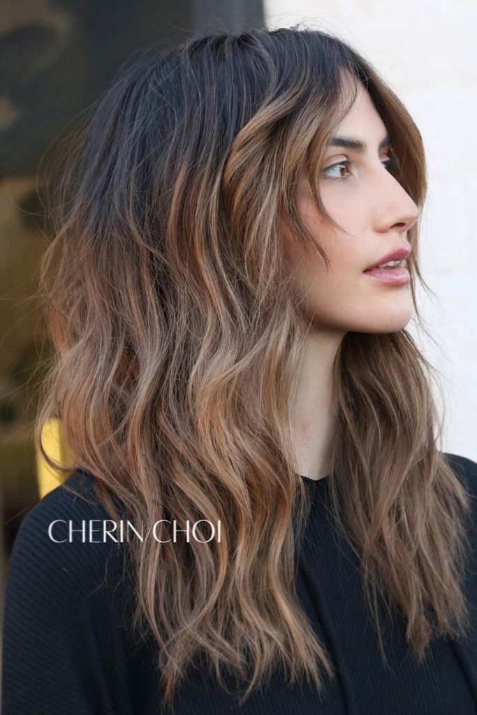The side-swept effect will bring some specialty to your whole central parting look, making you look super dreamy
