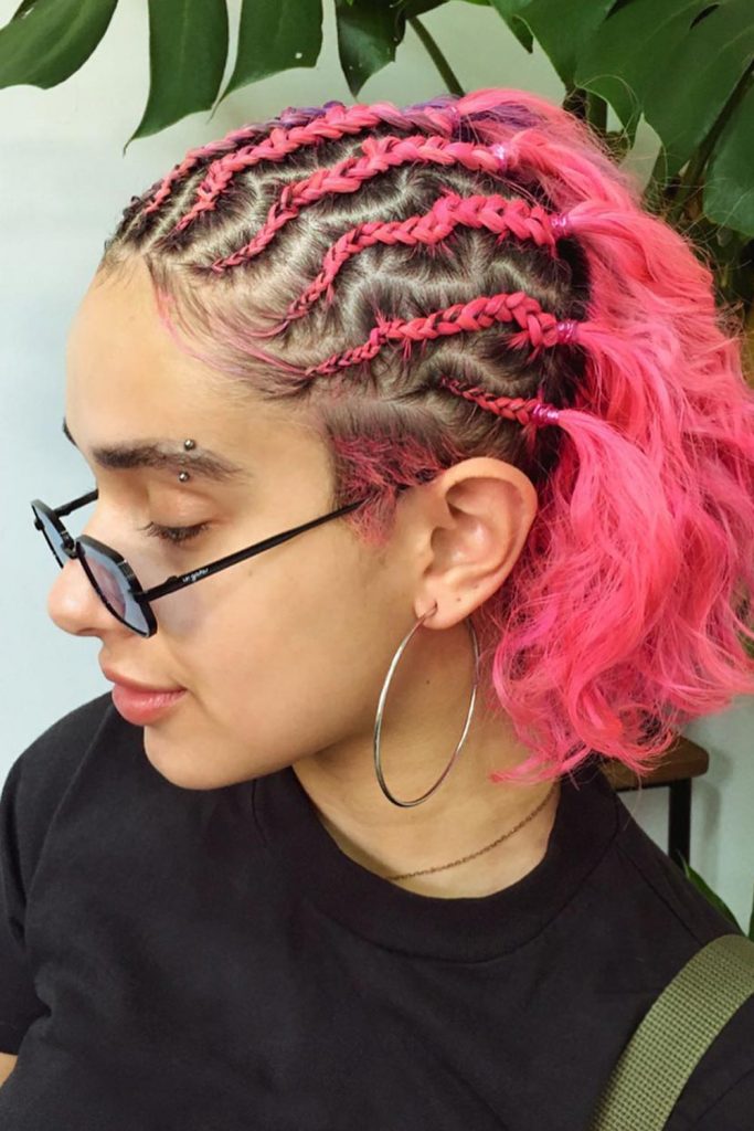 To tame your tresses and make them look neat and tidy, you may want to go for cornrow braids on the top of the head with the rest of the hair left loose