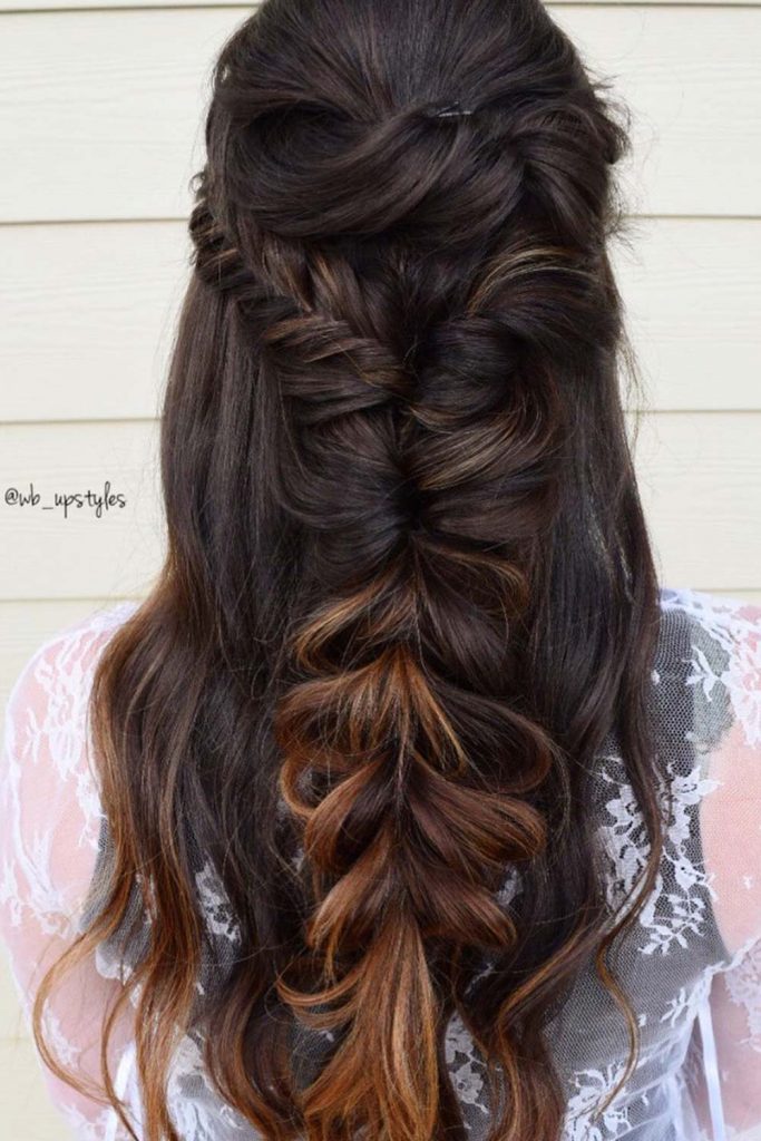 When you cannot decide what half up half down style to choose, you can never go wrong with a pull through braid